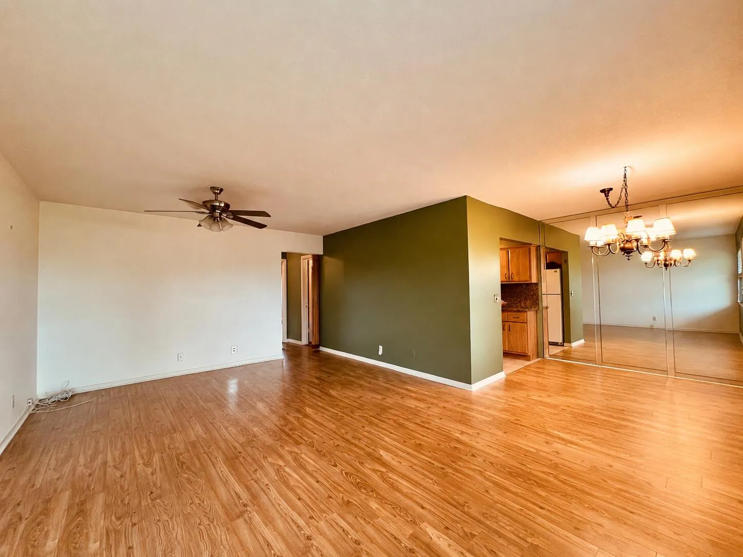 Lovely Living/Dining Area Featuring Updated Gleaming Wood Look Flooring!