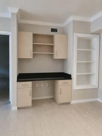 Built-in desk off dining area