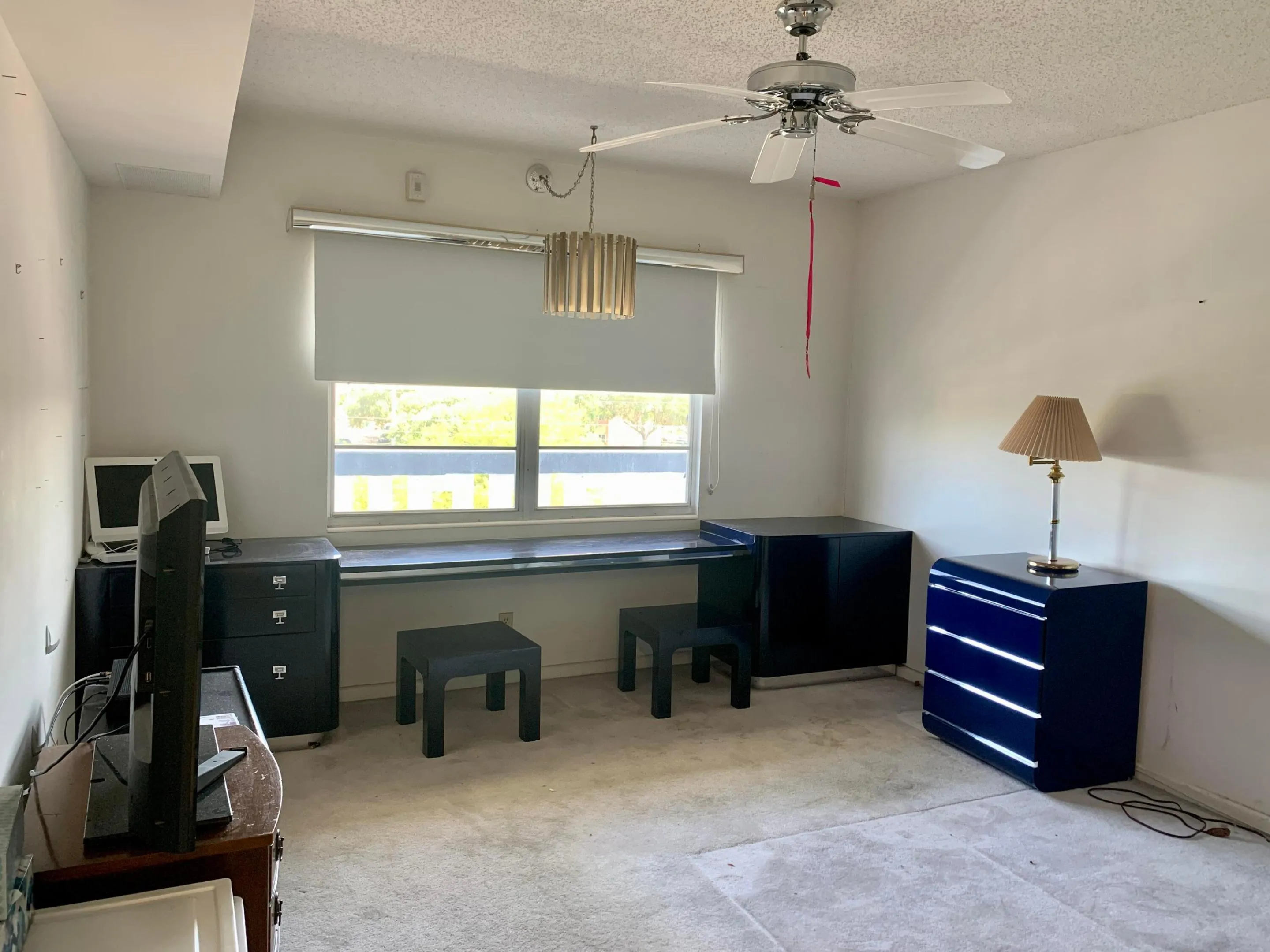Guest bedroom with a walk in closet