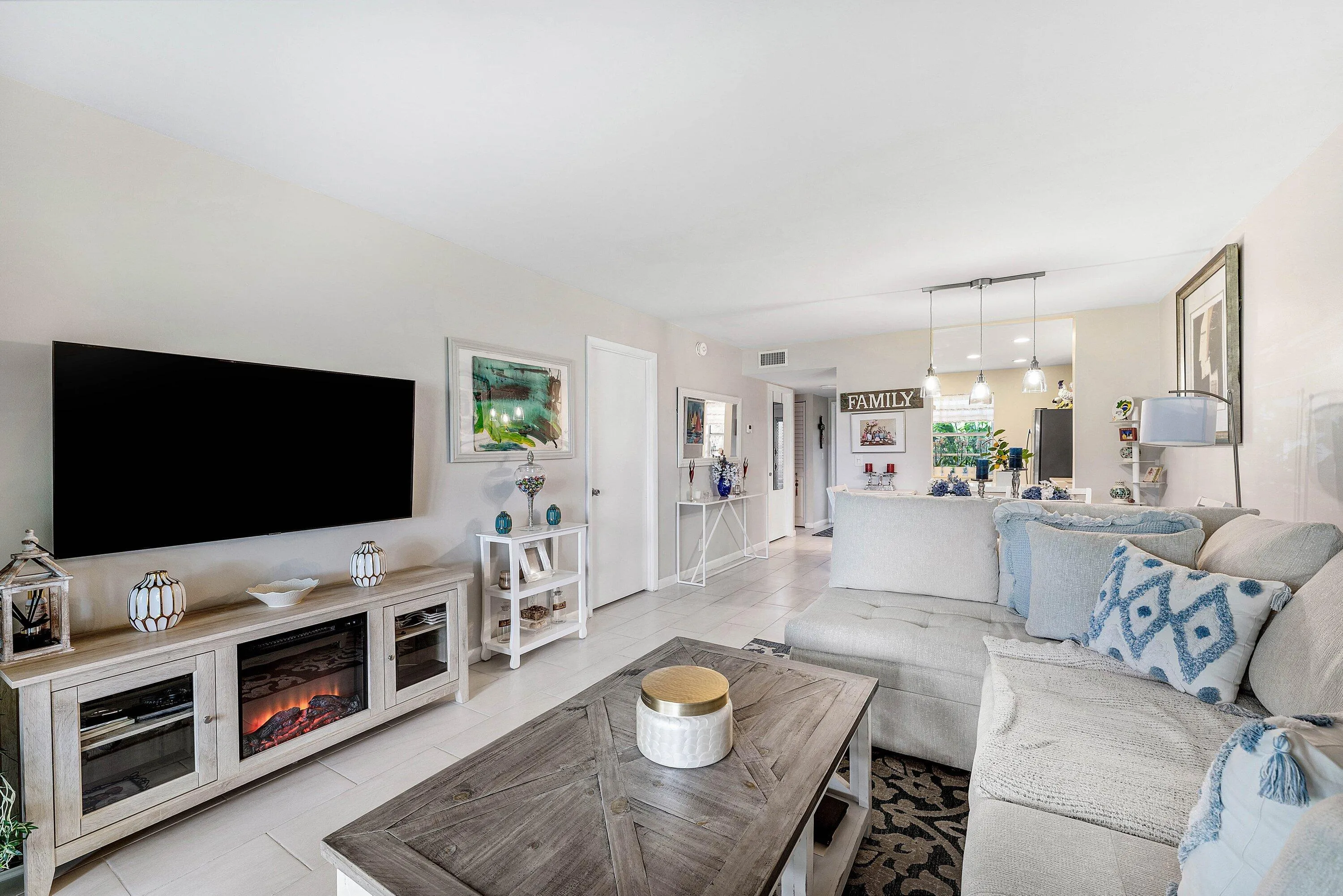 Cozy up on the couch to watch a movie and enjoy the ambiance from the fireplace.