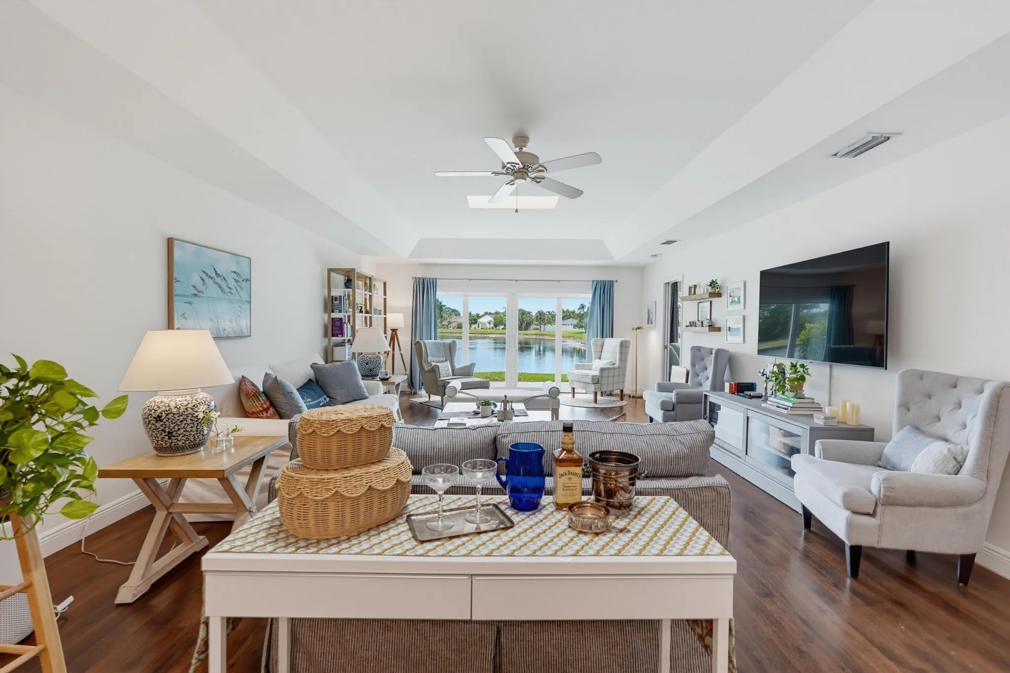 Smooth coated tray ceilings in this GIANT LAKEFRONT GREAT ROOM!