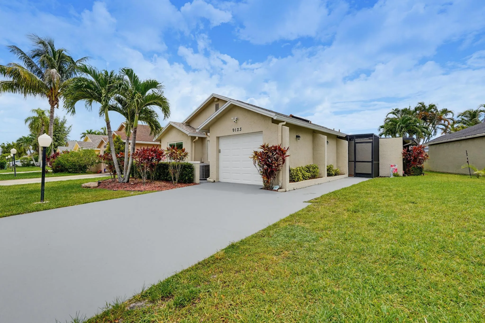 Spacious driveway and front yard