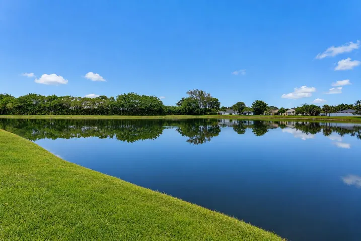 Scenic views across the wide lake maintained by the HOA