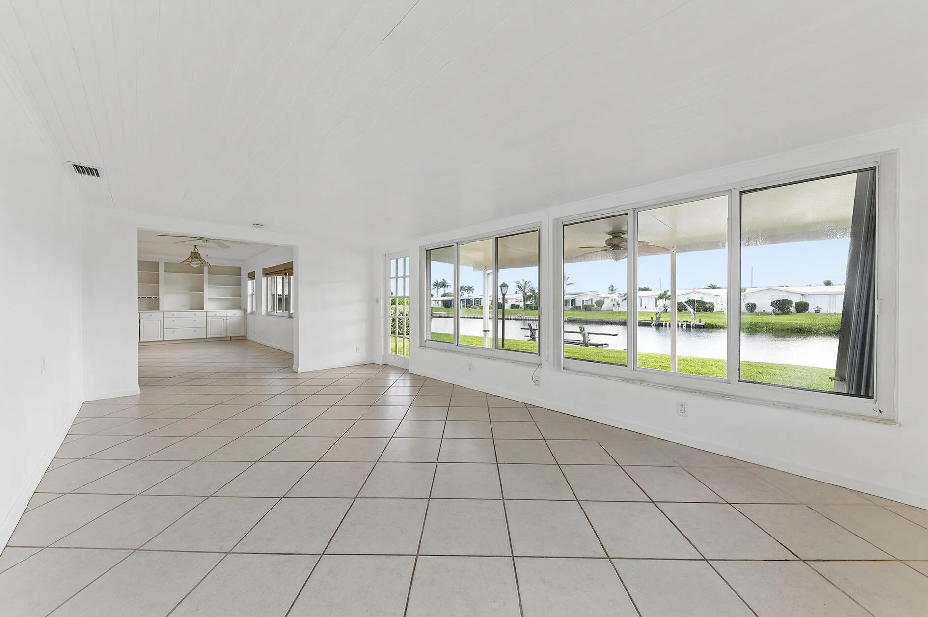 Additional family room with access to back porch area. Great water views.
