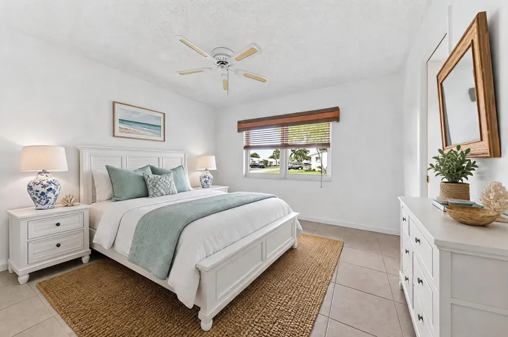 Guest bedroom virtually staged. Walk in closet plus access to guest bathroom.