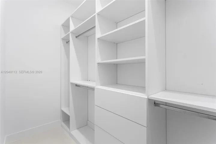 Custom Built His & Her Closet