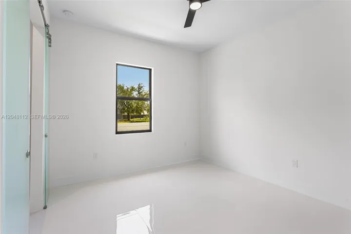 The SPLIT BEDROOM LAYOUT ensures PRIVACY with a LARGE GUEST SUITE, separate HALL Bathroom