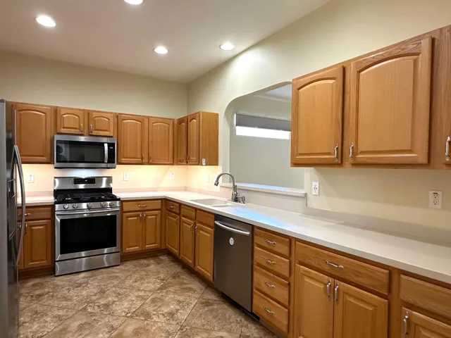 Wood cabinets and Corian countertops