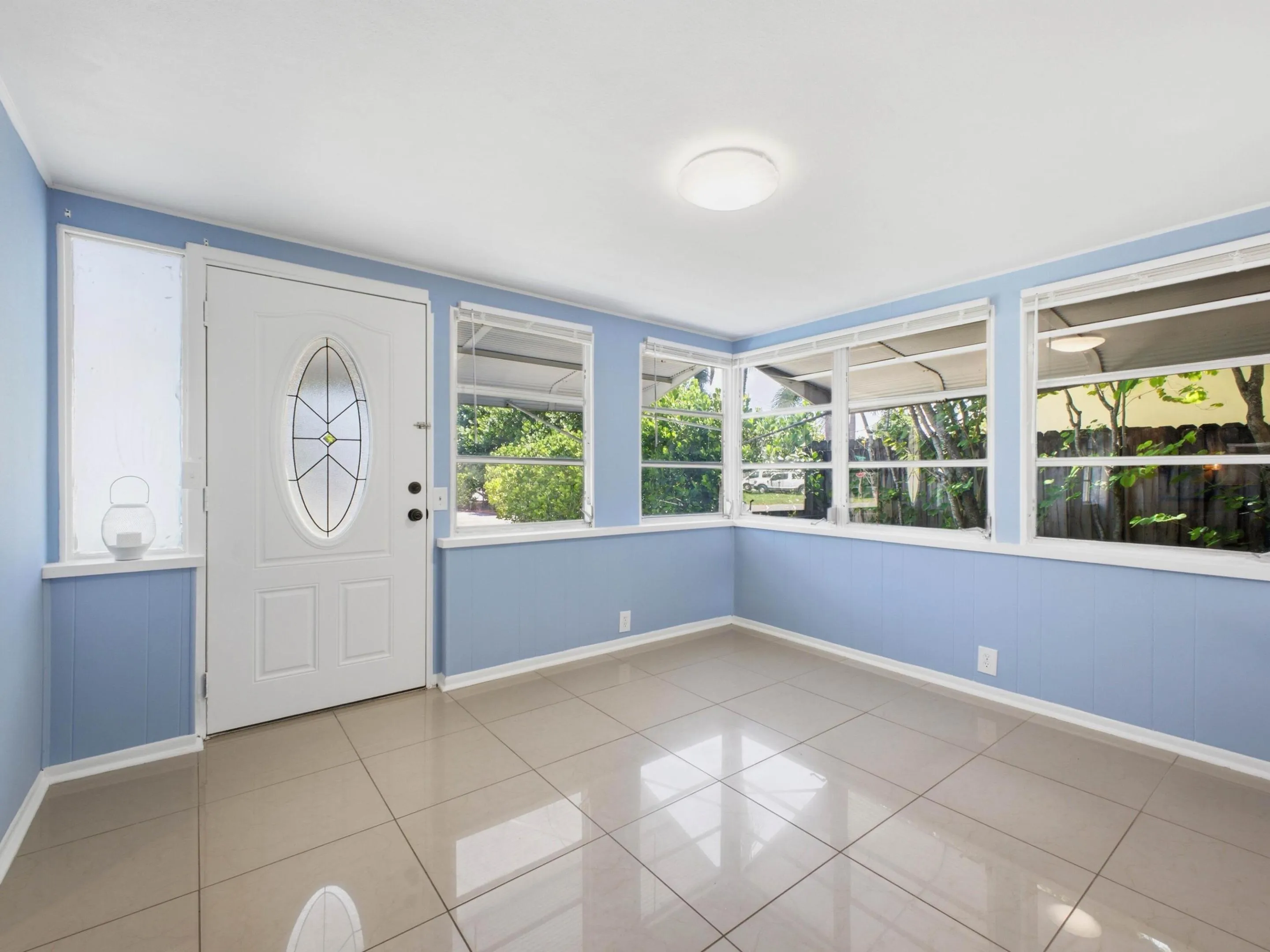 French doors in Florida room which can be use as a 3rd bedroom