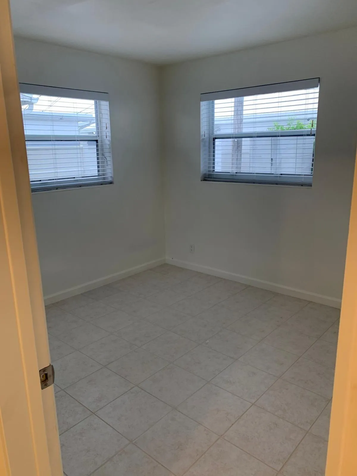 Square tile flooring with a neutral finish