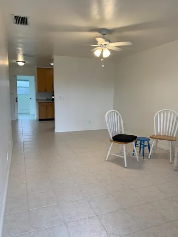 Light-toned tile flooring throughout the primary living area