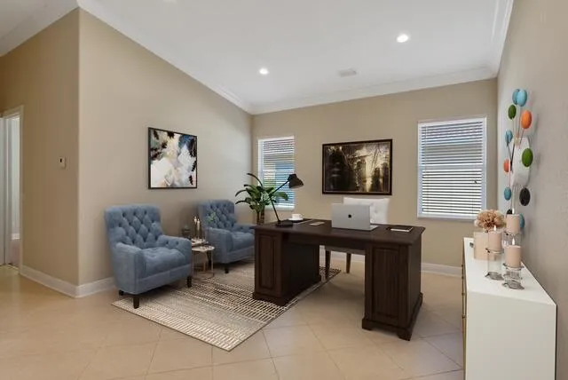 Office space with ornamental molding, light tile patterned floors, and recessed lighting