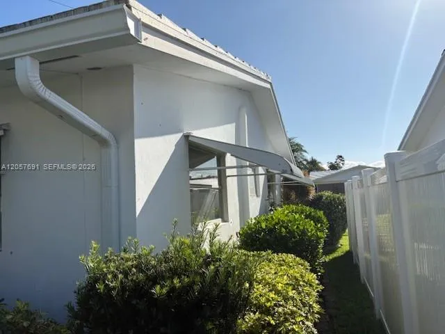 Side yard well manicured
