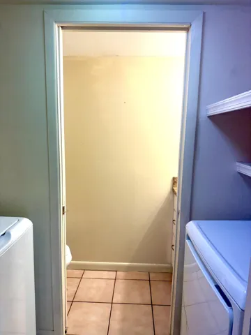 Laundry Room/Powder Room off Kitchen