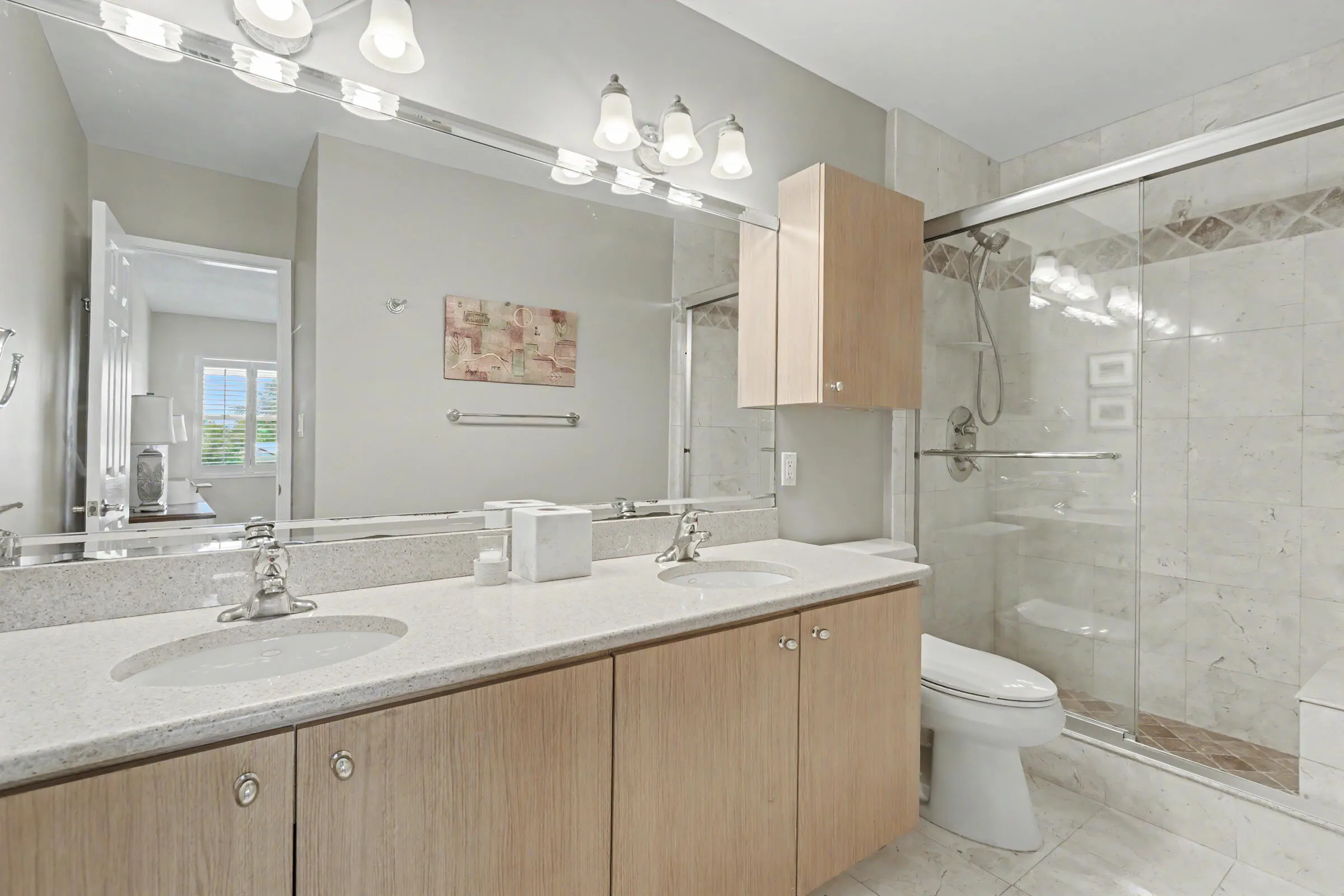 Primary bath features double sink vanity.