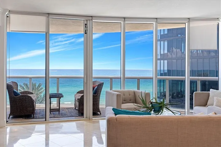 From the moment you step inside, breathtaking ocean views unfold before you, creating a stunning backdrop from every room.
