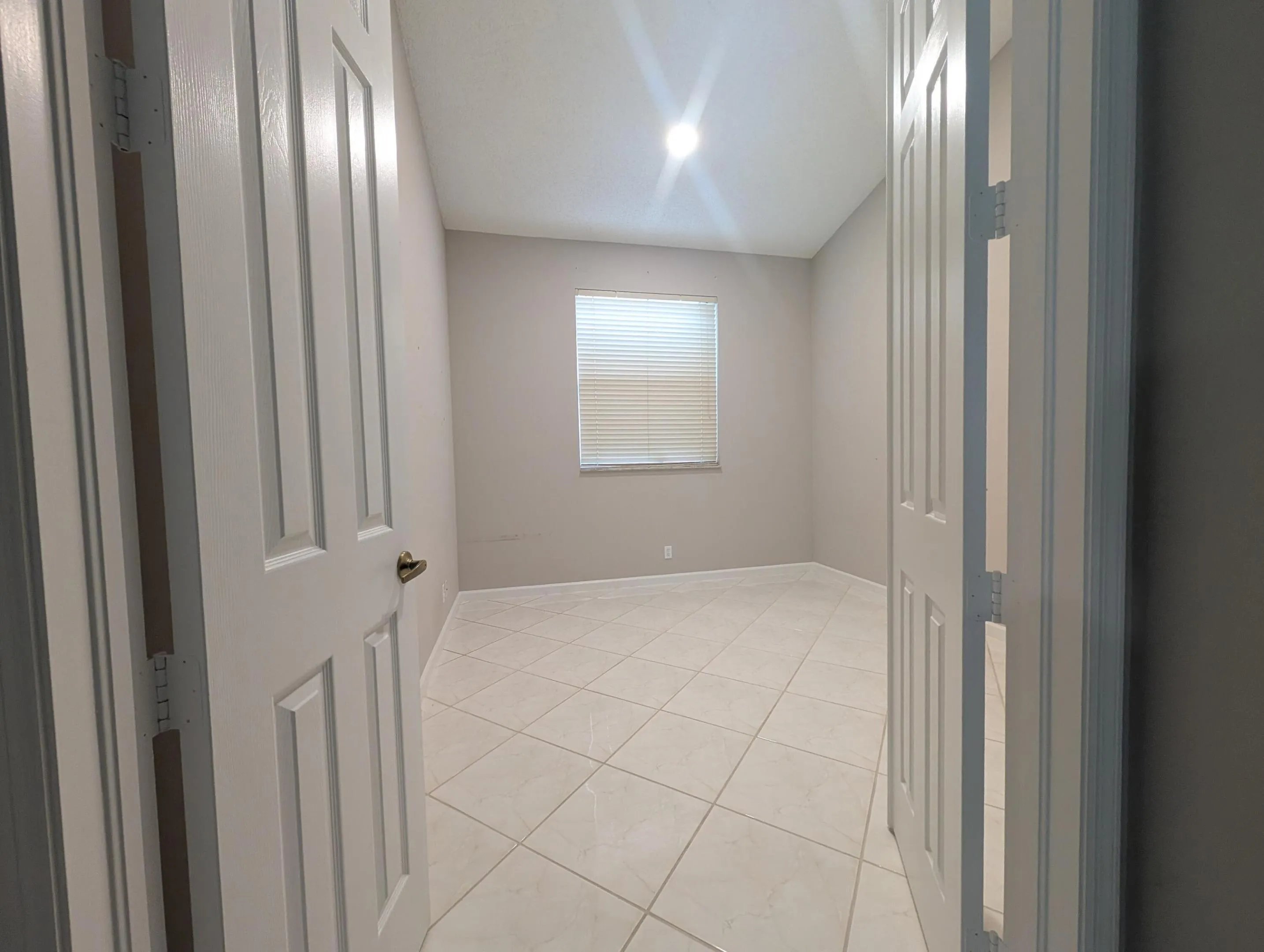 French Door entry on comfortable sized 3rd bedroom