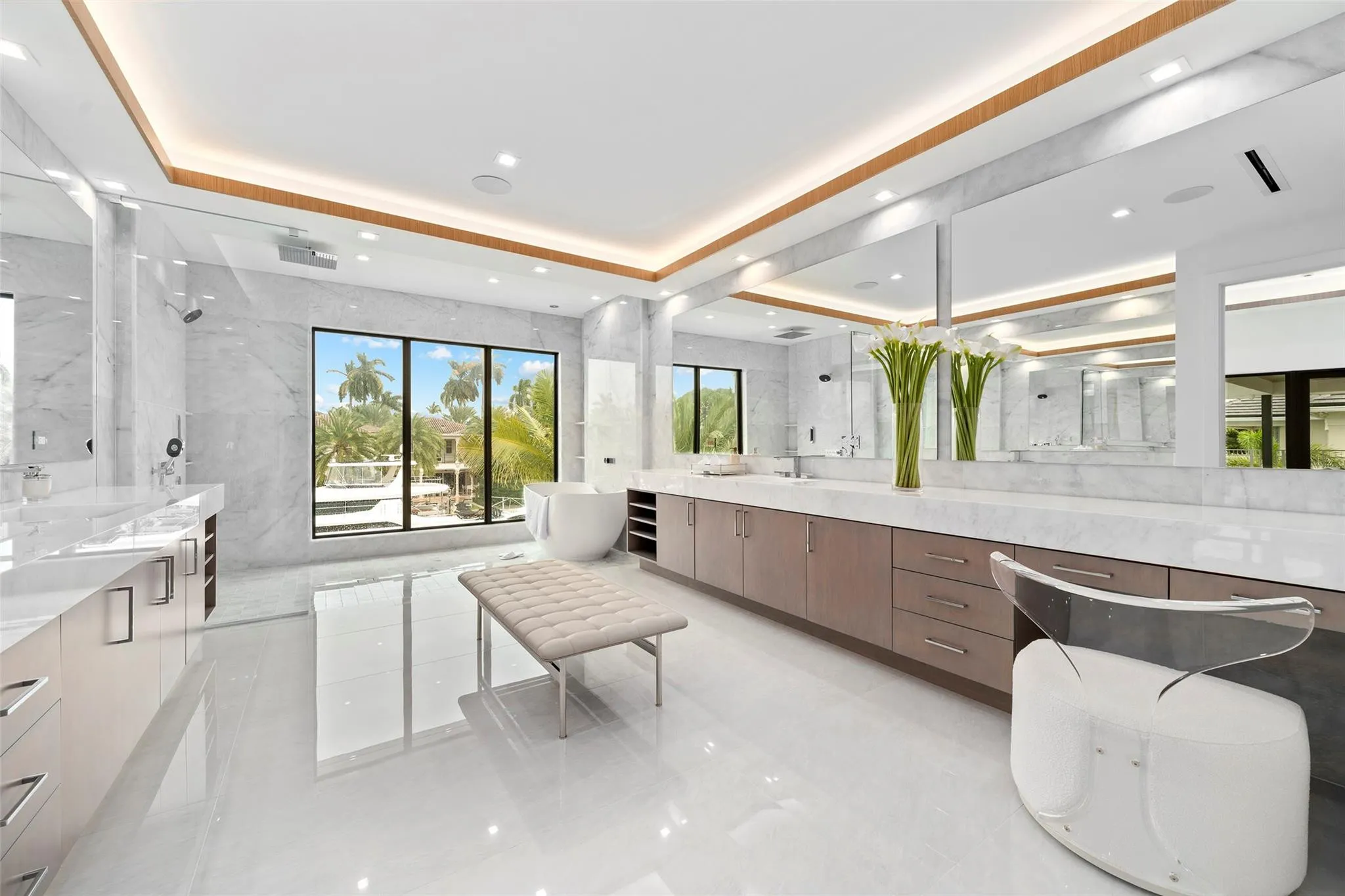 Spacious Primary Bathroom with Spectacular Water Views, Separate Vanities, and Luxurious Finishes