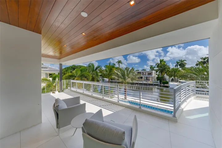 The second floor features a private patio in front of the master bedroom