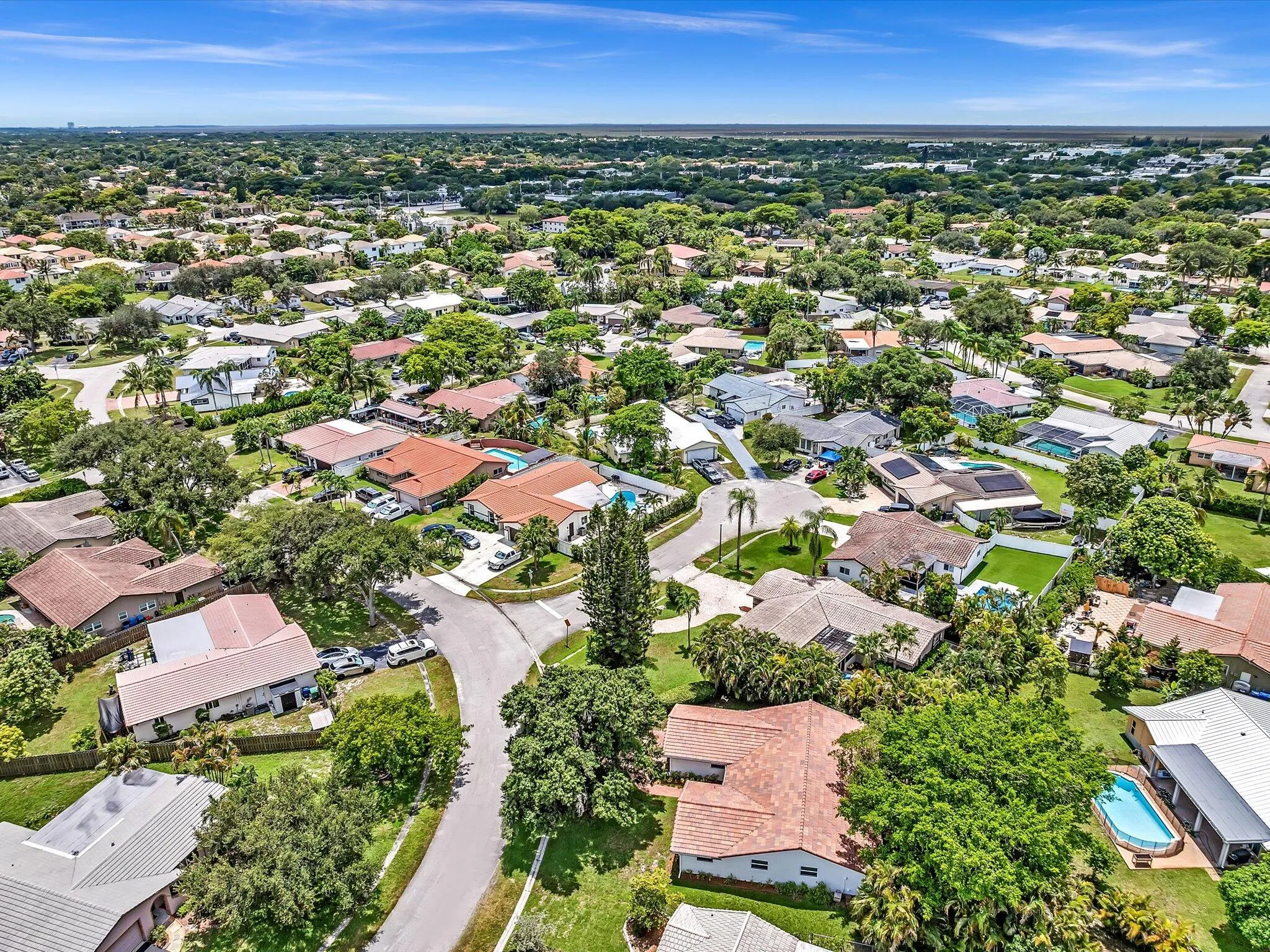 Aerial perspective showcasing a residential neighborhood with numerous single-family homes