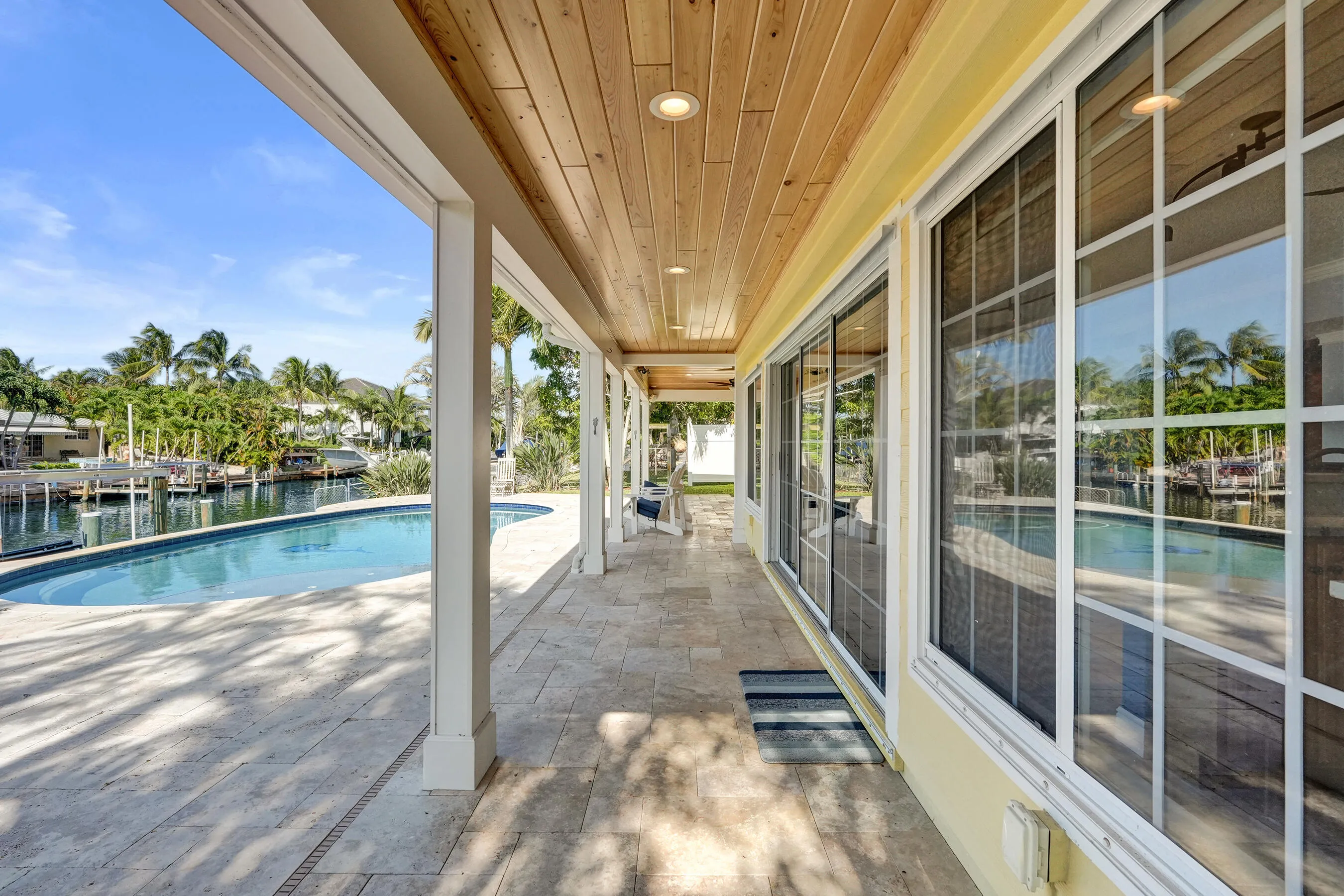 Covered patio with T&G Ceilings. This walkway measures 25'3 x 5'5.