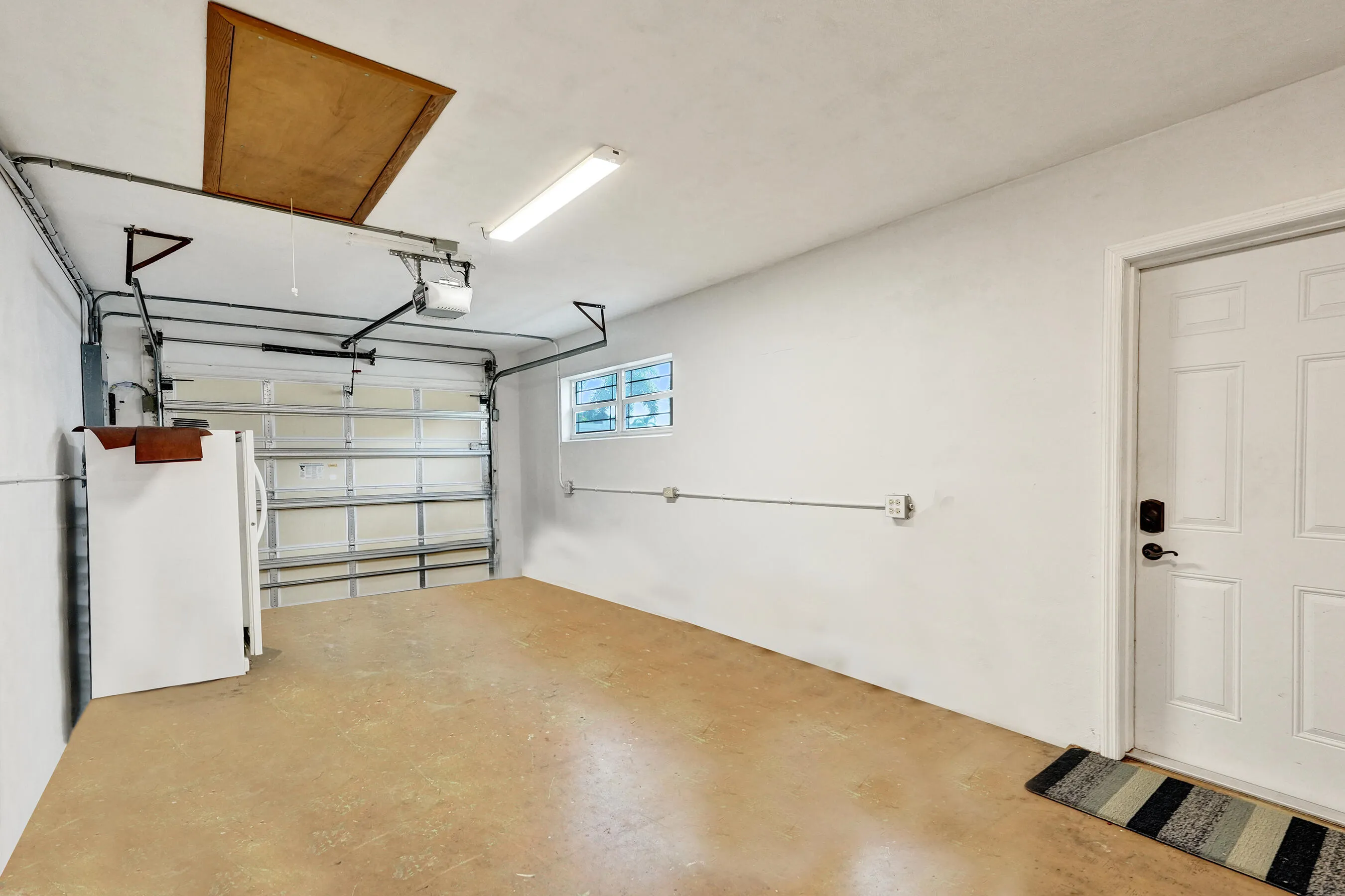 1 car garage measuring 26'6 x 11'7.