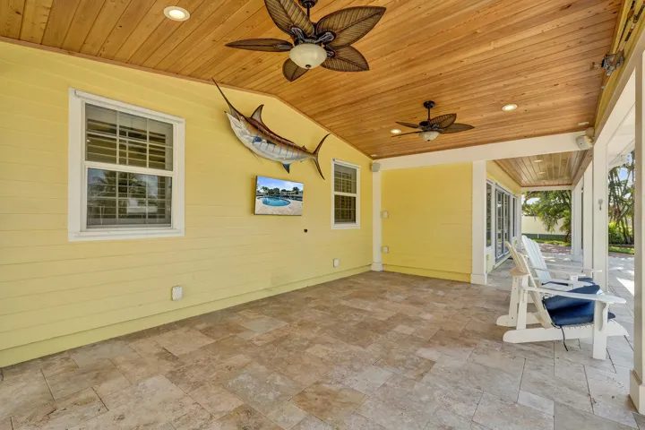 Large covered patio with Cypress T&G ceilings 21'4 x 13'. Icynene foam insulation installed beneath the cypress patio ceiling.