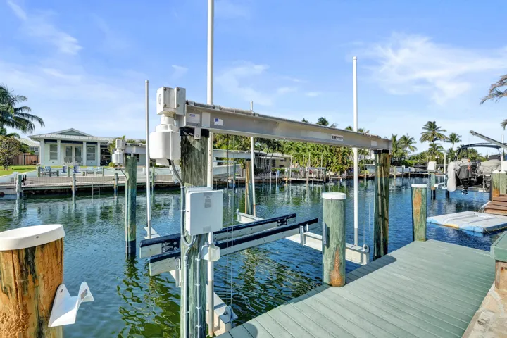Property has 2 High Tide boat lifts rated 16,000 lbs and 12,000 lbs.