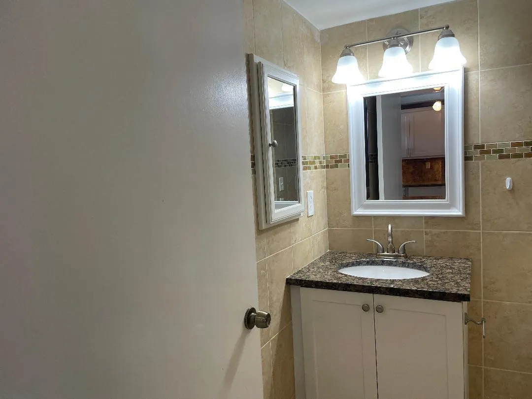 WITH TILE FLOOR TO CEILING