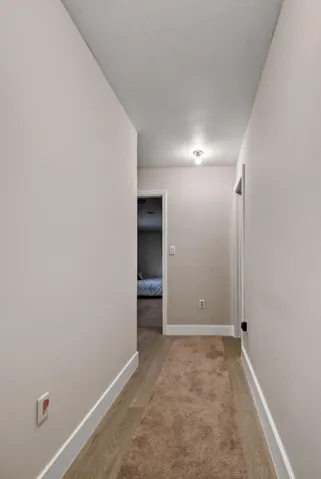 Hallway heading to primary Bedroom 22x15