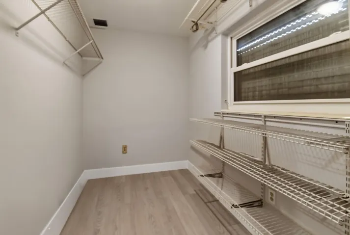 Large walk-in closet off primary bedroom