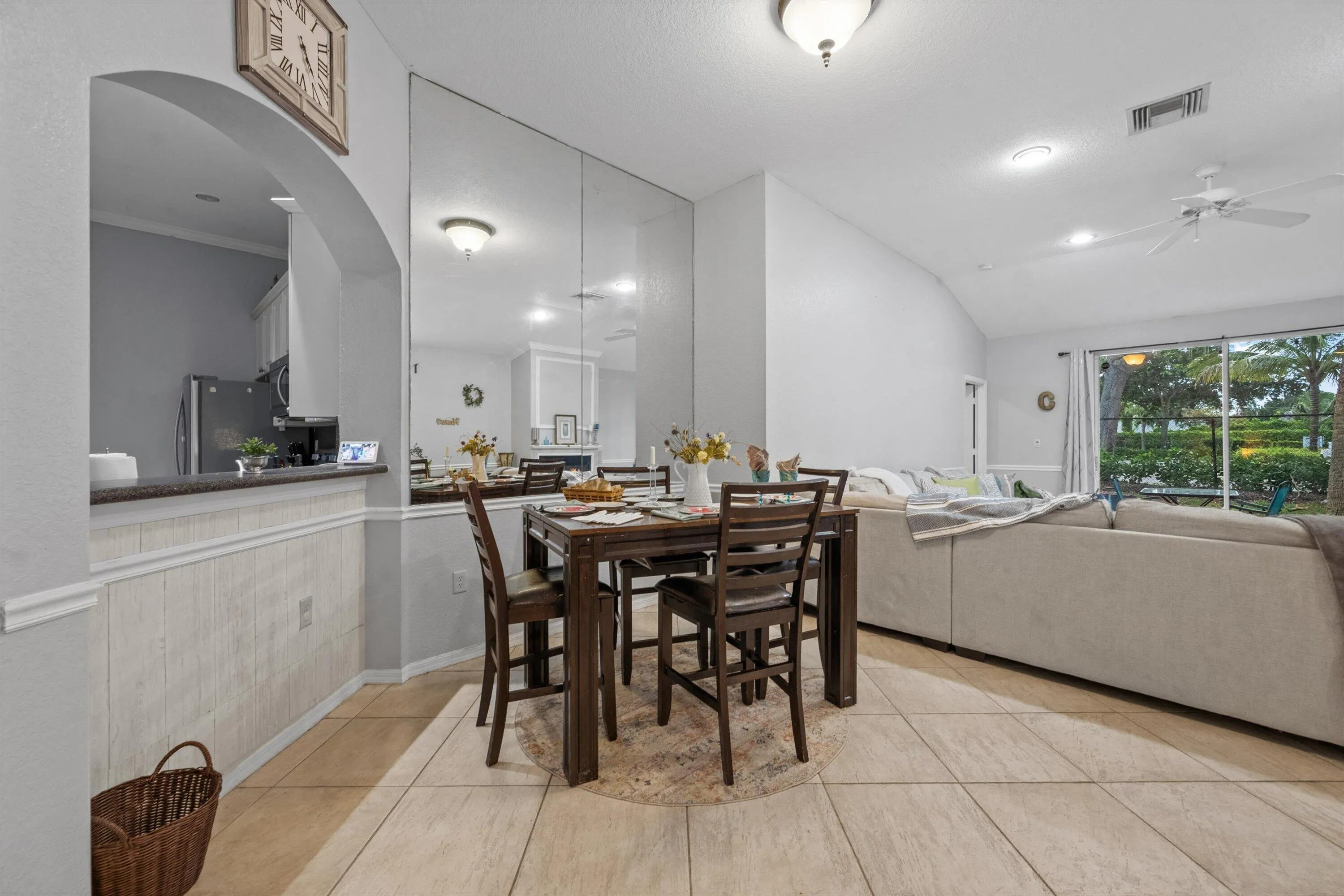 Open-concept dining area featuring tiled flooring