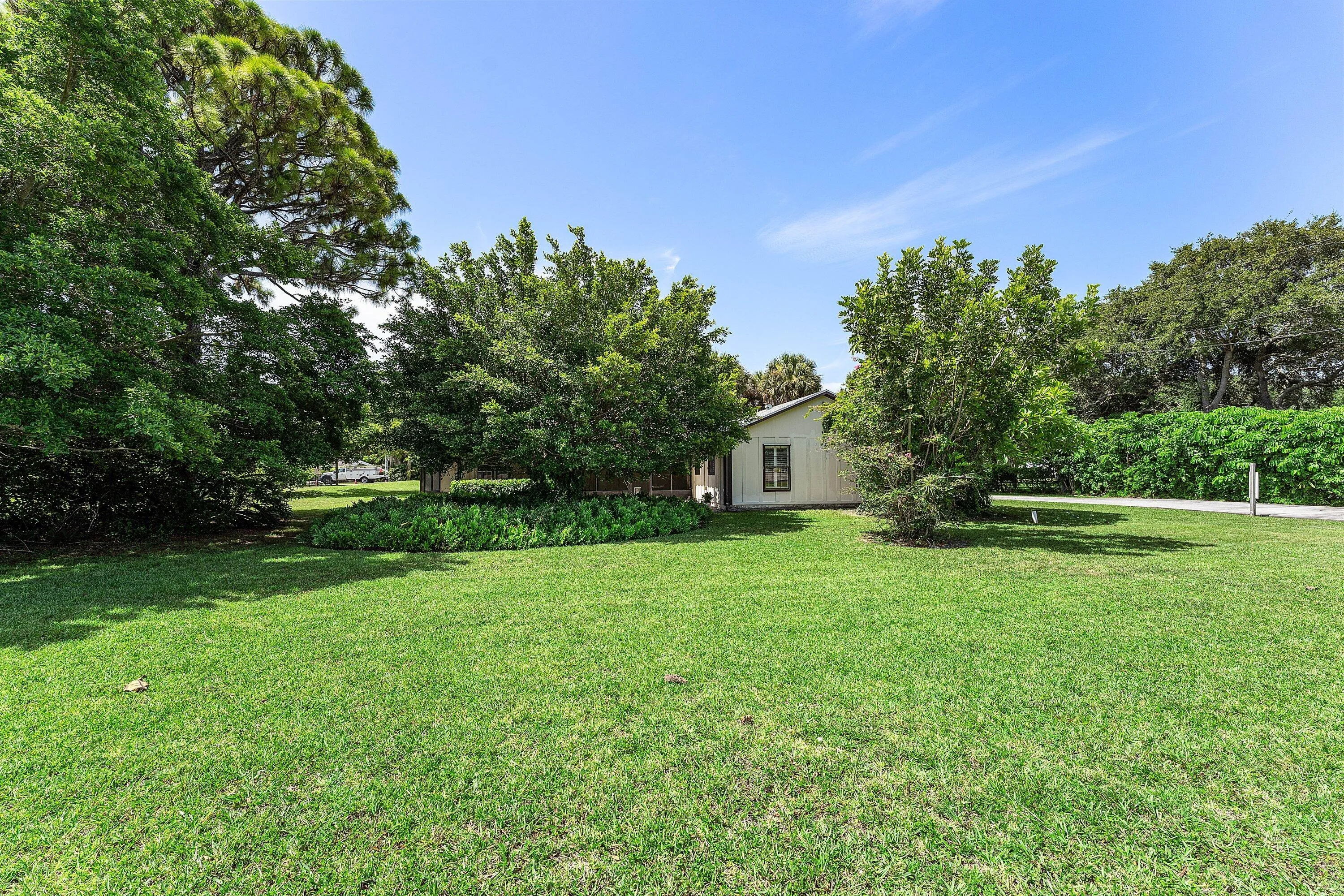 Mature treed yard with space for all activities or just taking in nature.