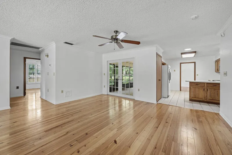 Family Room Open to Kitchen and Screen Porch. Enjoy casual dining here.