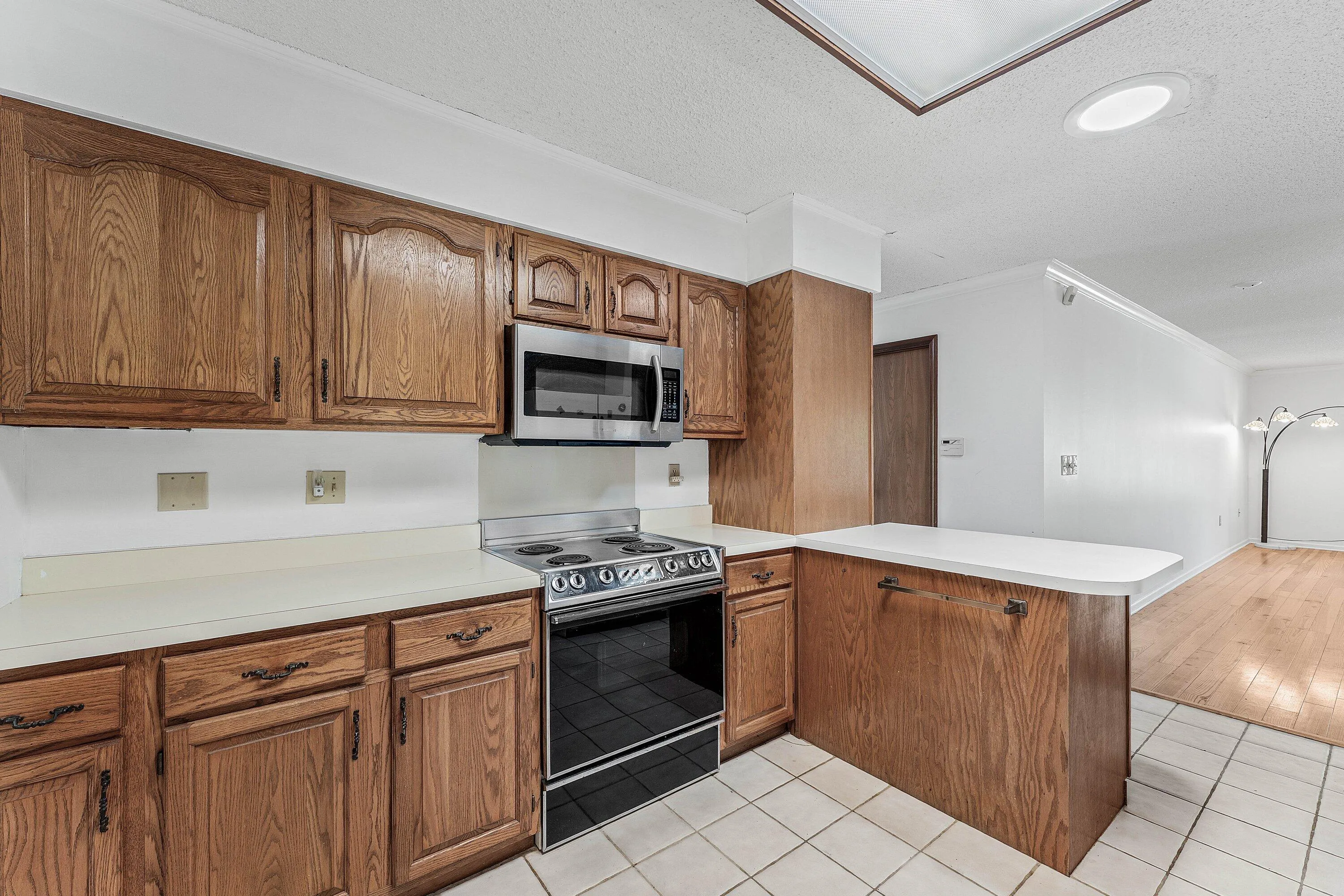 Kitchen provides lots of counter space and ample storage.