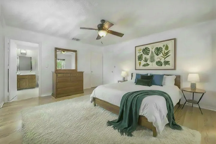 Split floor plan bedroom with ensuite bathroom.