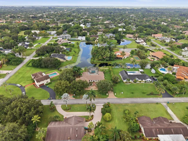 Expansive residential properties featuring lush green landscaping