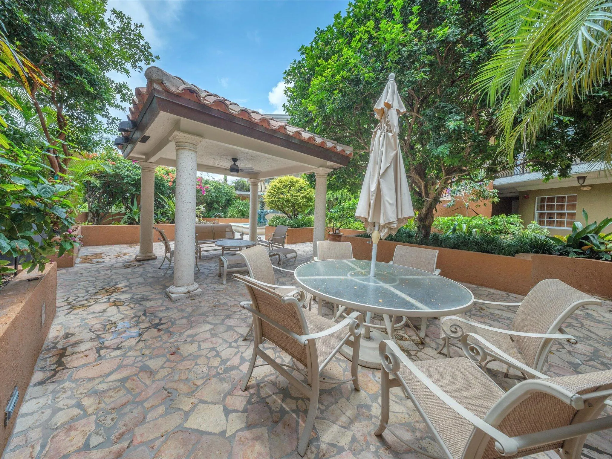 Relax outdoors in a serene gazebo patio area