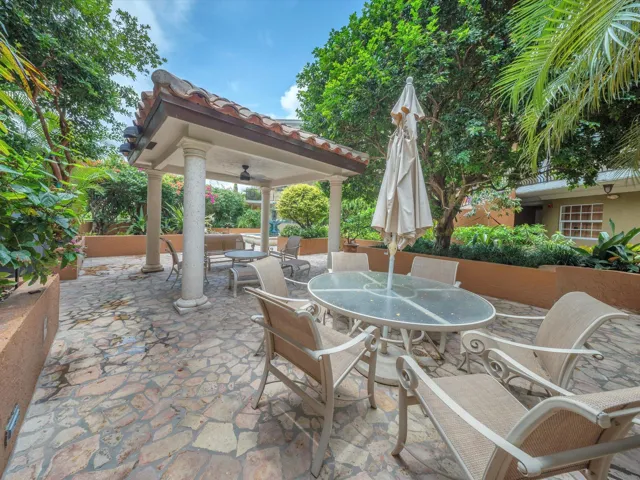 Relax outdoors in a serene gazebo patio area