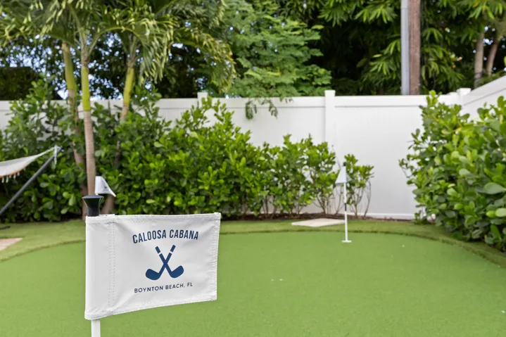 3 hole putting green. Putters provided.