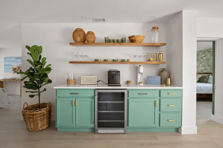 Espresso machine, beverage fridge, storage.