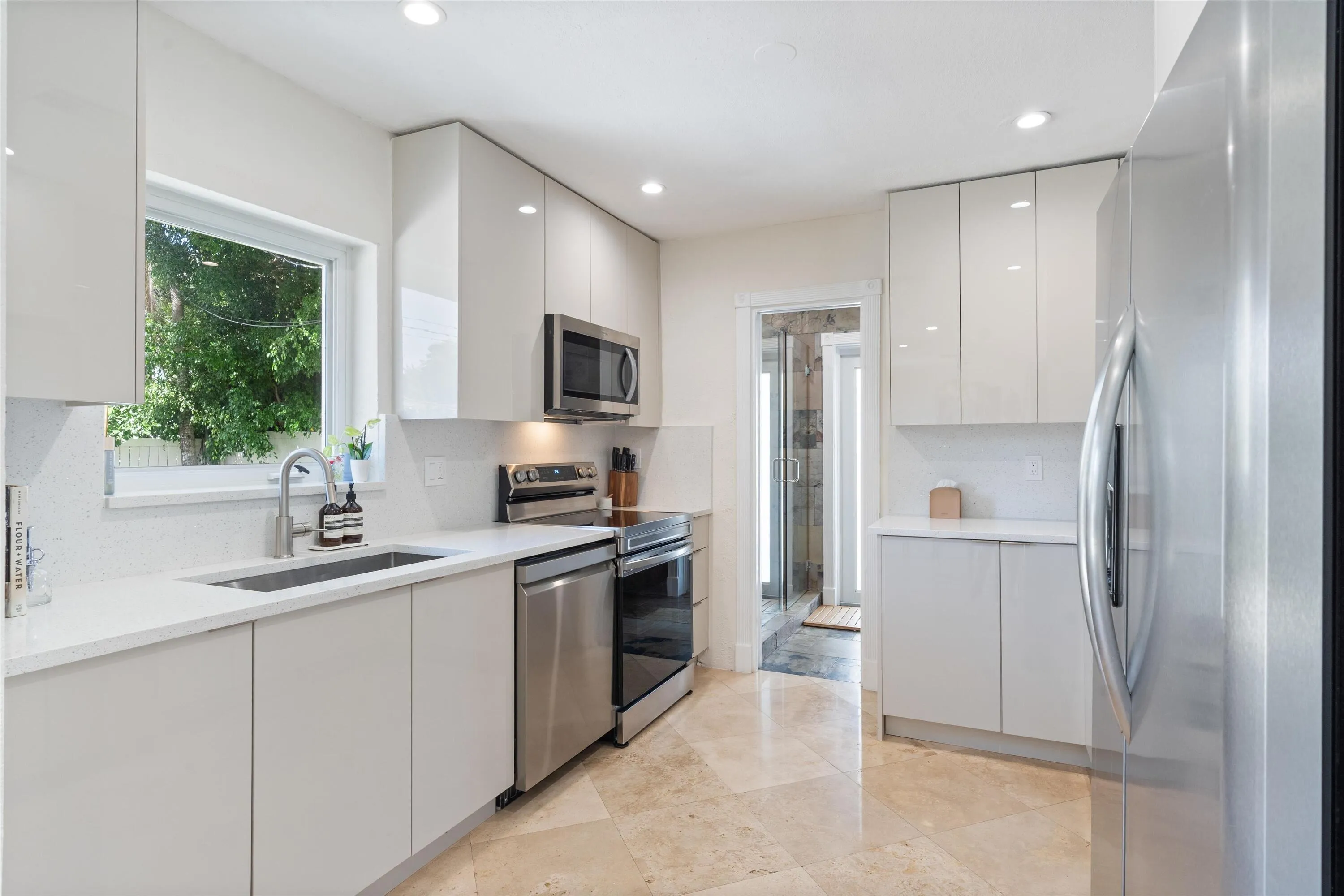 Renovated kitchen with stainless appliances