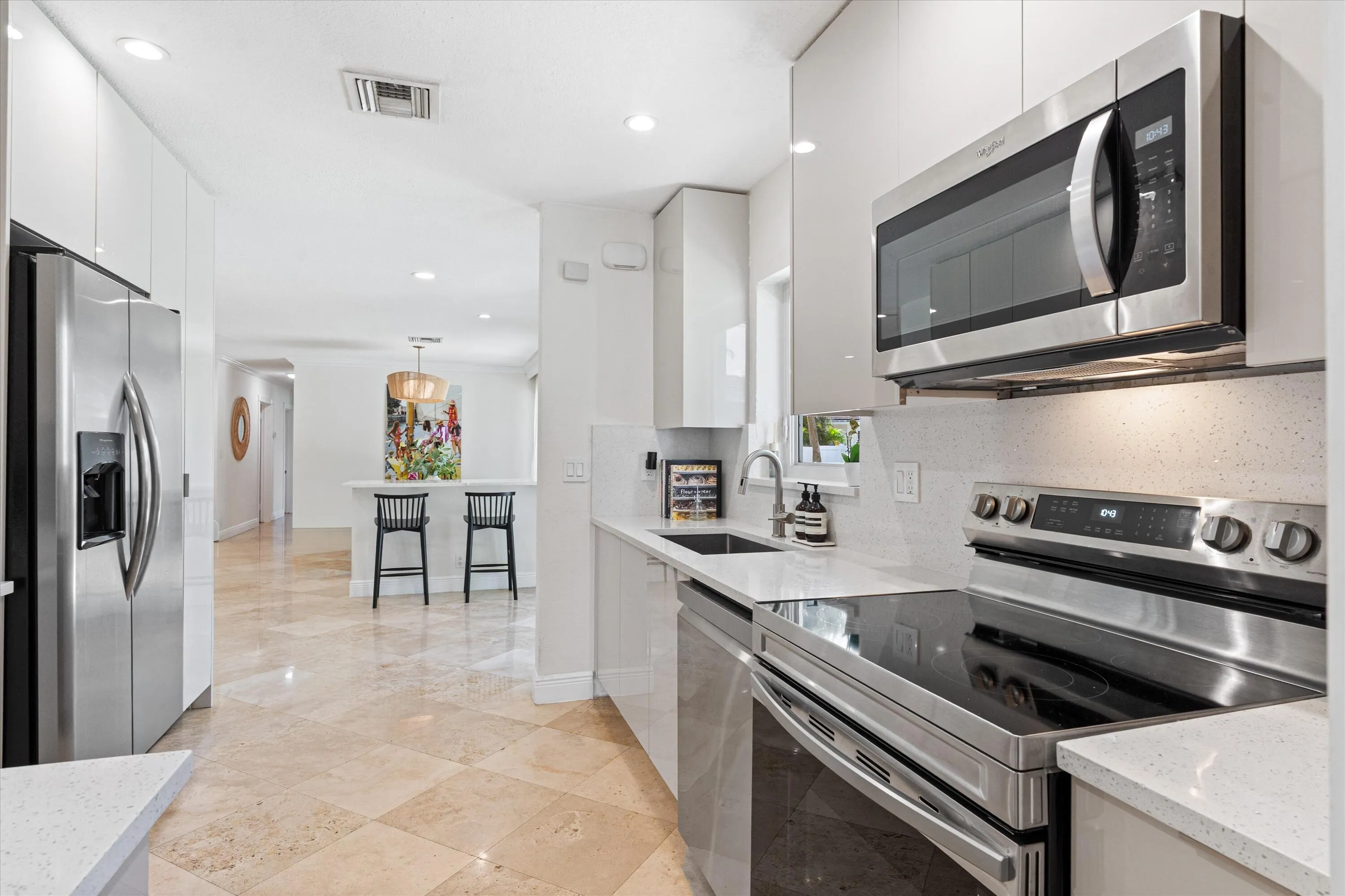 Renovated kitchen with stainless appliances