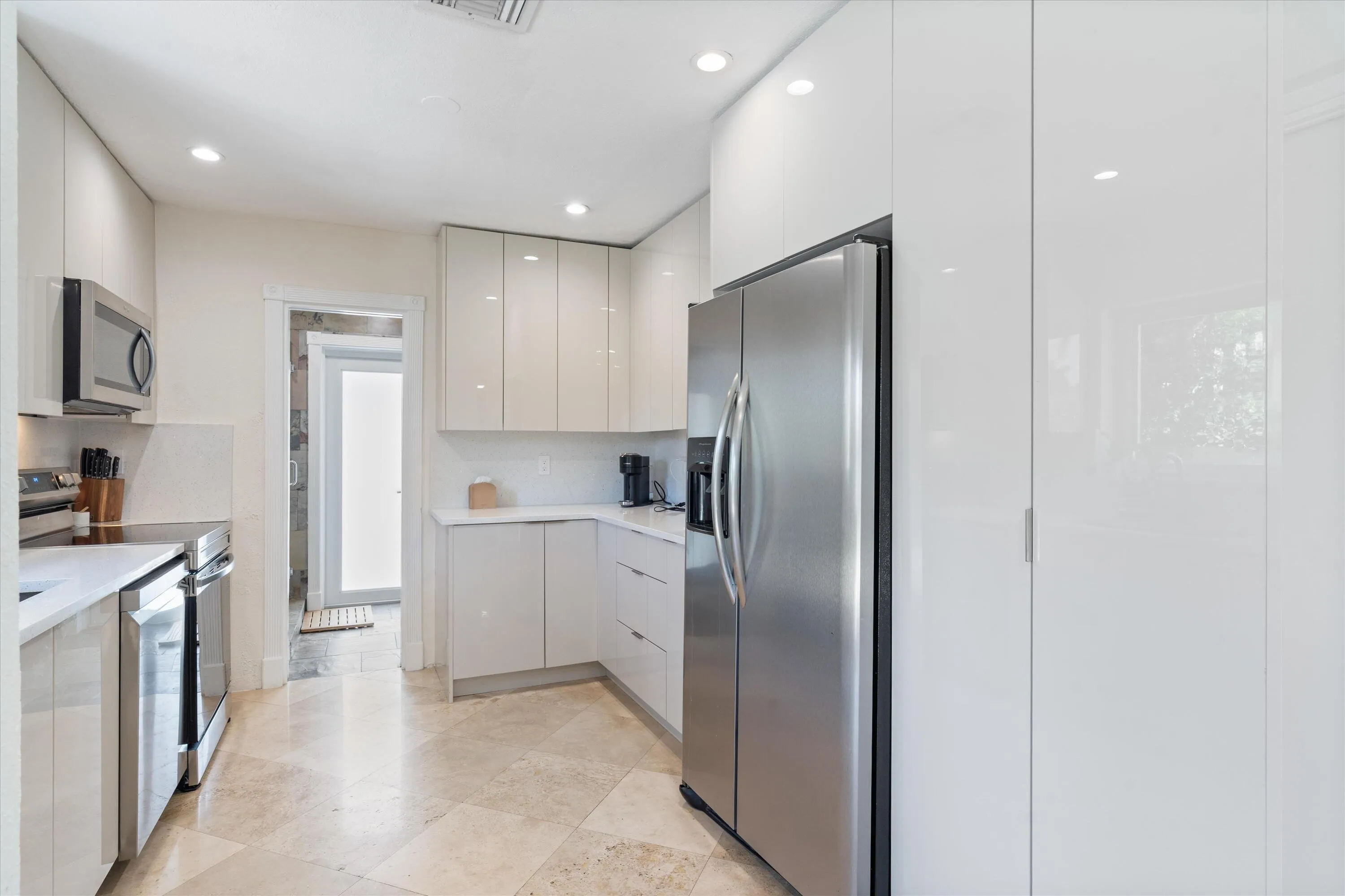 Renovated kitchen with stainless appliances