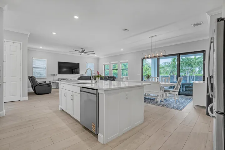 Open to Living Areas and view of Pool