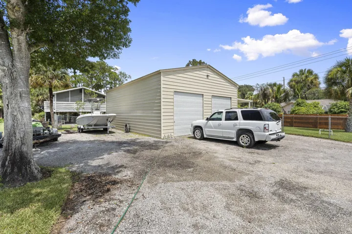 Detached workshop and additional boat/ vehicle parking areas.