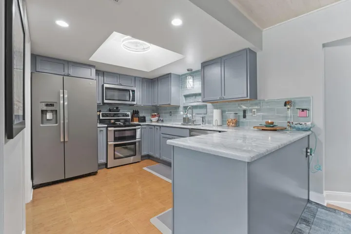 Renovated kitchen located next to the dining area.