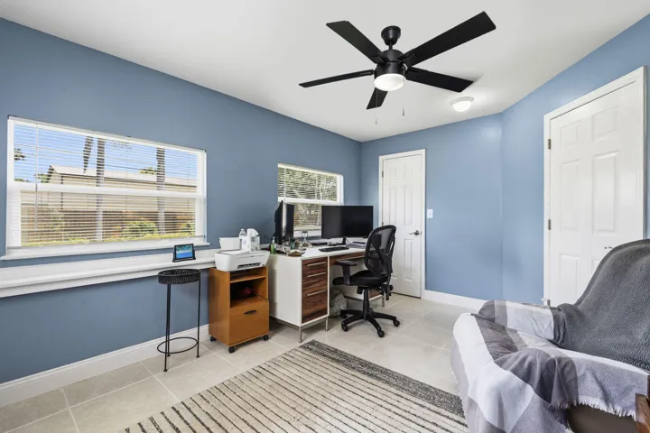 Located at the rear of the home near the kitchen.
