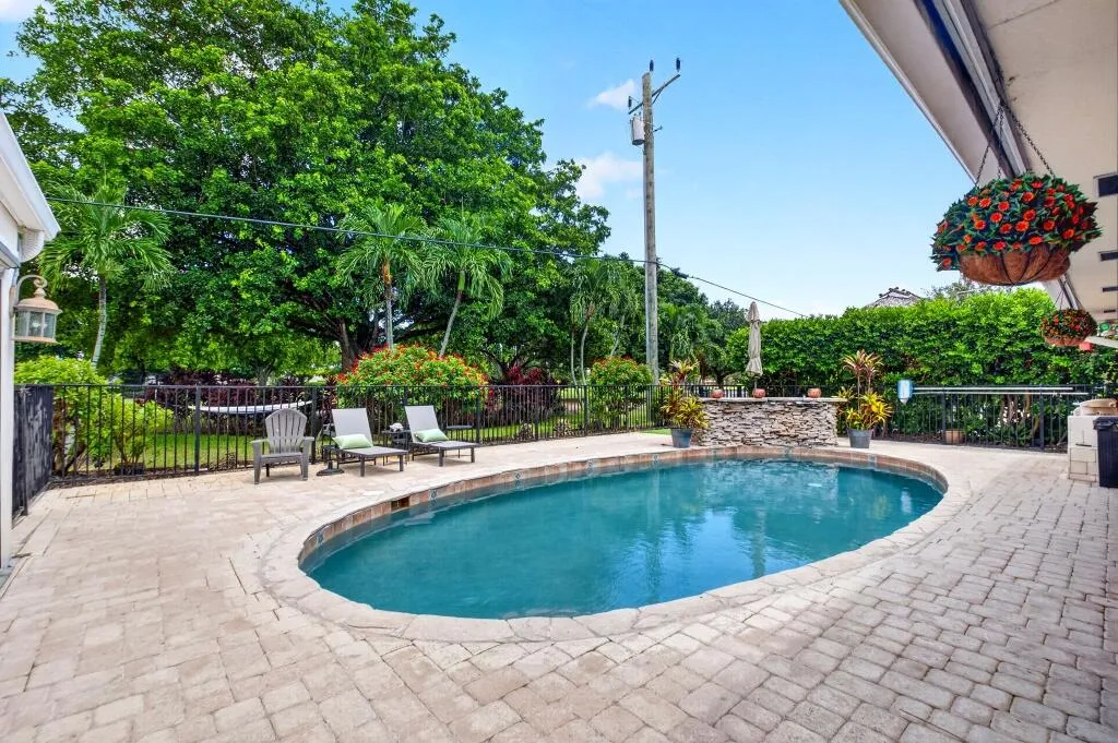 Free-Form Pool with Golf Course Just Beyond