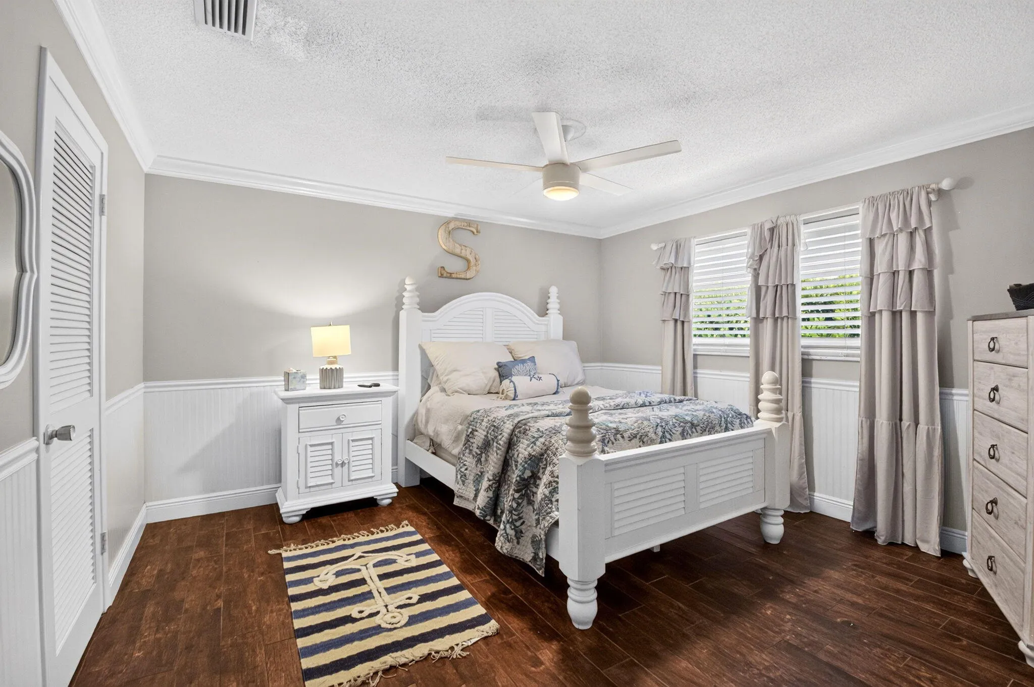 Bedroom with Beadboard Wainscot & Shutters